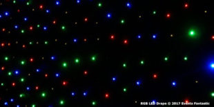 A dark backdrop with scattered RGB LED lights in various colors, including red, green, and blue, reminiscent of star drapes. Text at the bottom reads "RGB LED Drape © 2017 Events Fantastic.